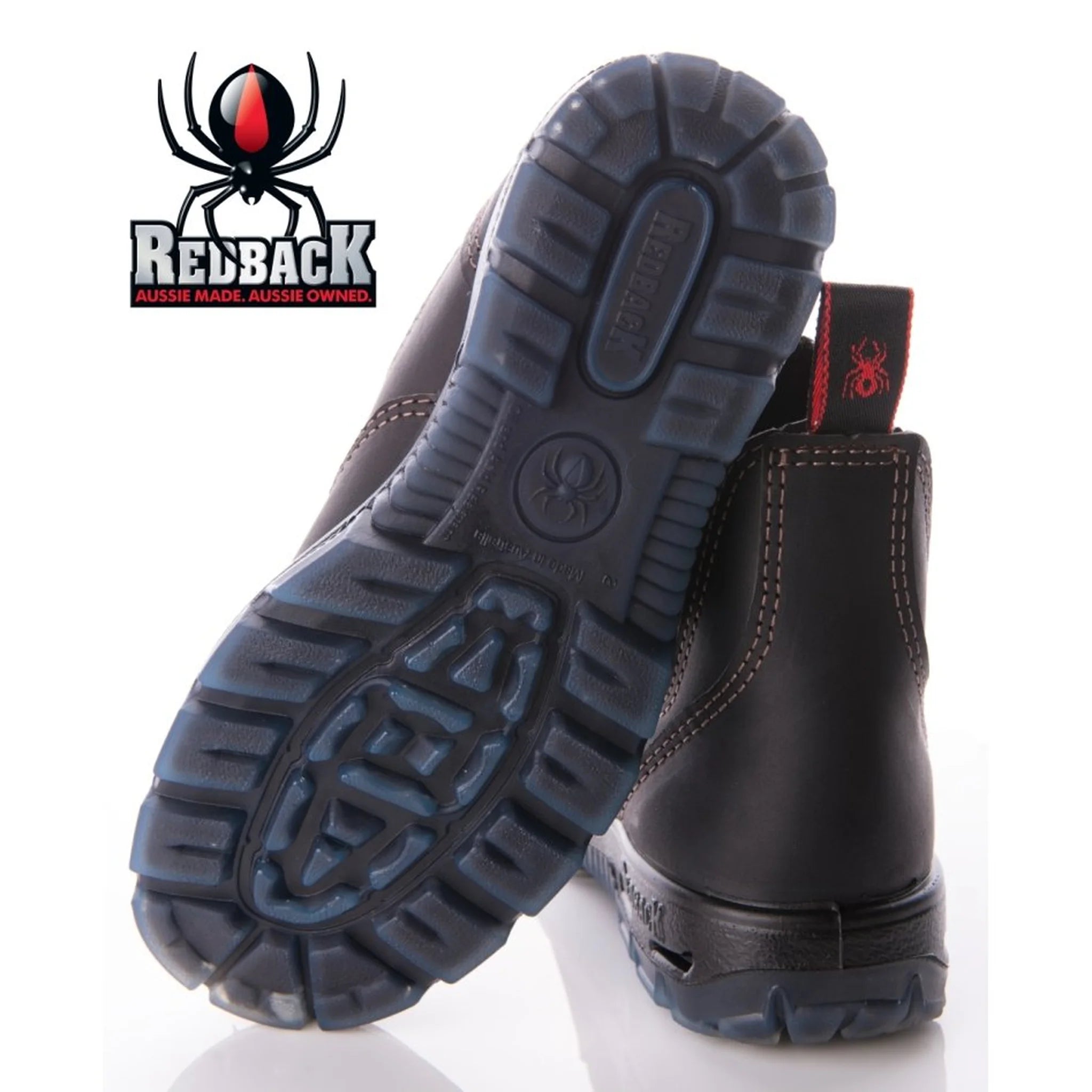 Translucent grip sole of Redback UBOK boot showing multidirectional lug pattern and air‑cushioned midsole