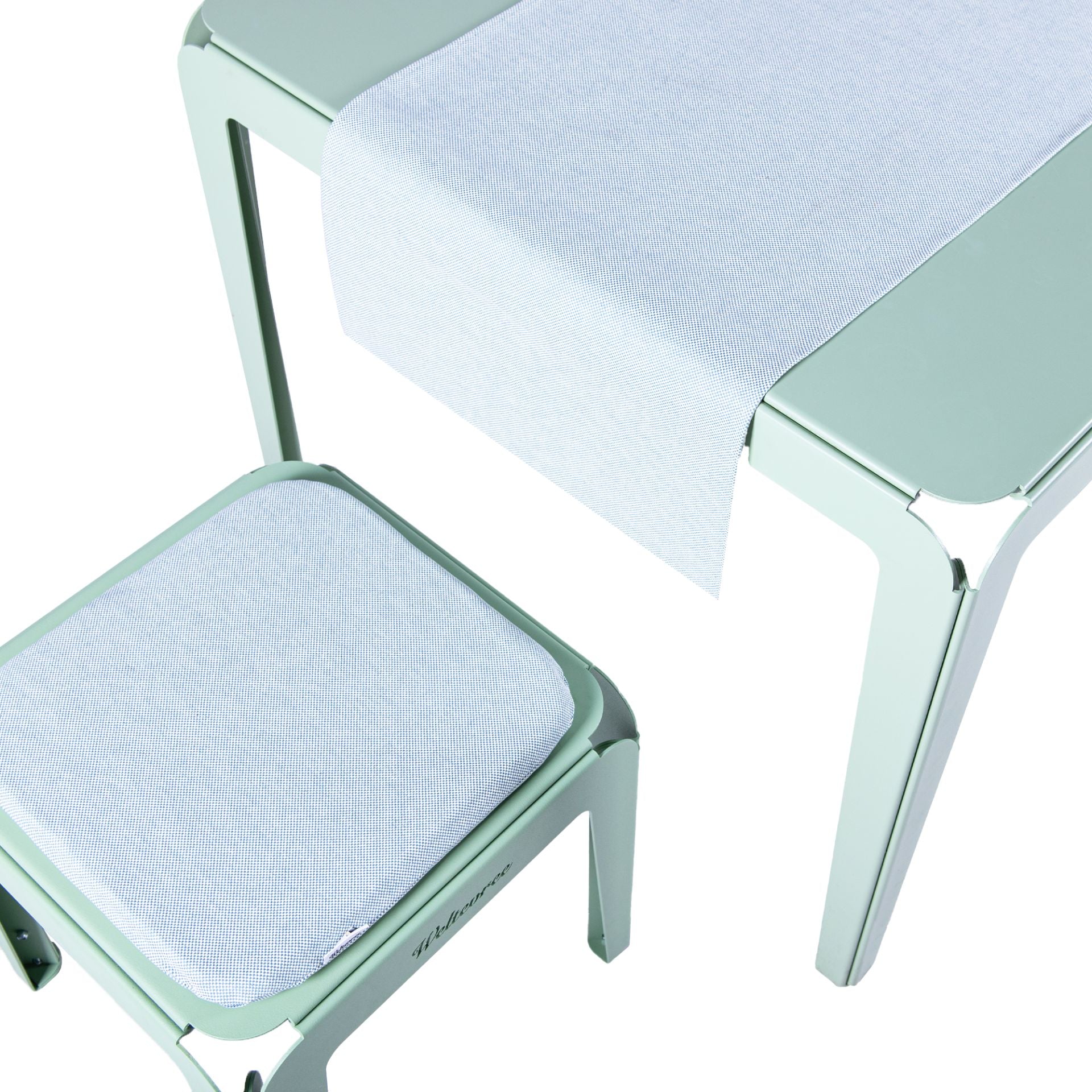 Bended Cushion shown on the bended stool at the end of table